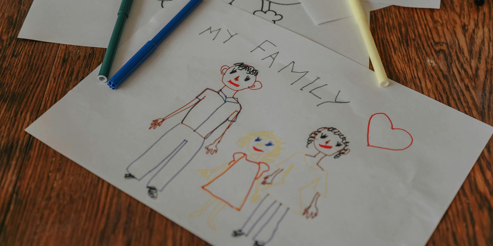 Preserving childhood drawings in an photo book